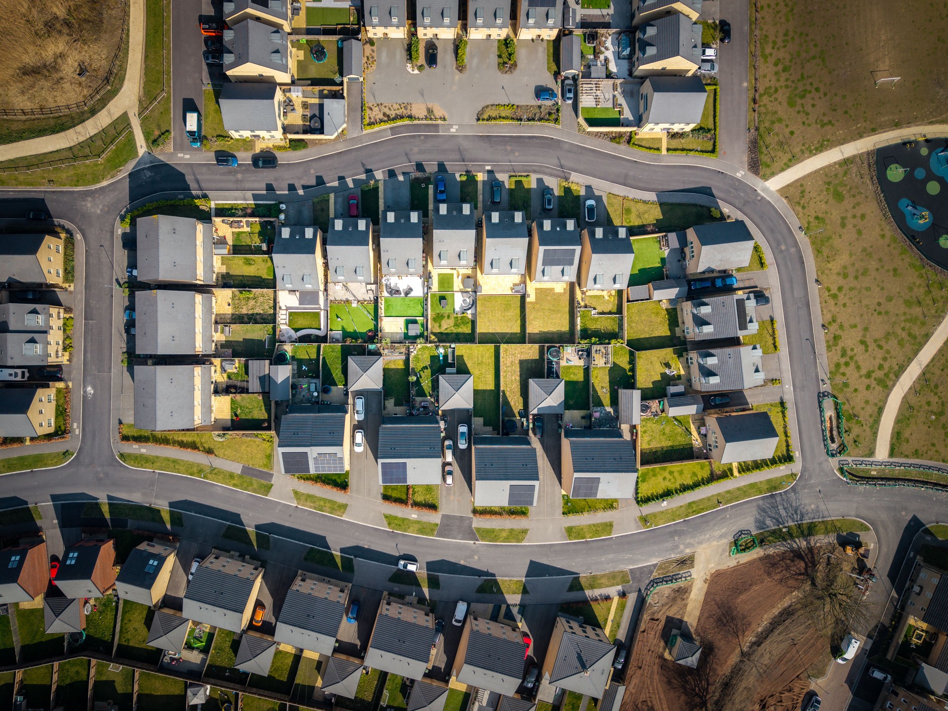 Aerial view directly above a new build housing estate in the UK